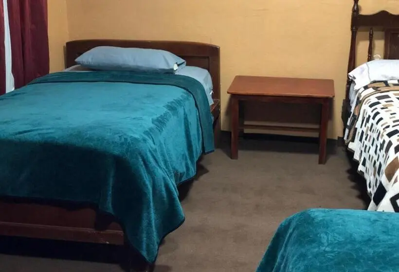 اتاق استاندارد چهارنفره با سرویس بهداشتی مشترک, Hostal Pachamama Lodge
