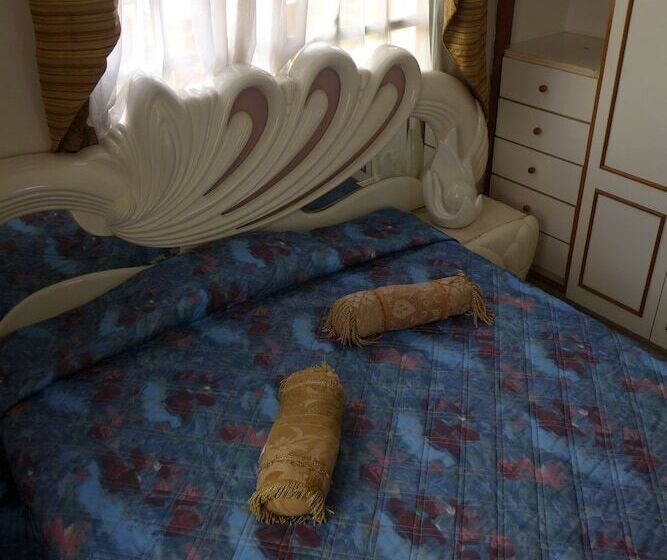 带共用浴室的标准房间, Dumas Villas