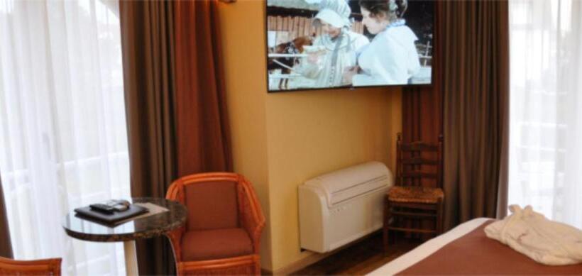 Номер Стандарт Вид на Сад, Approach