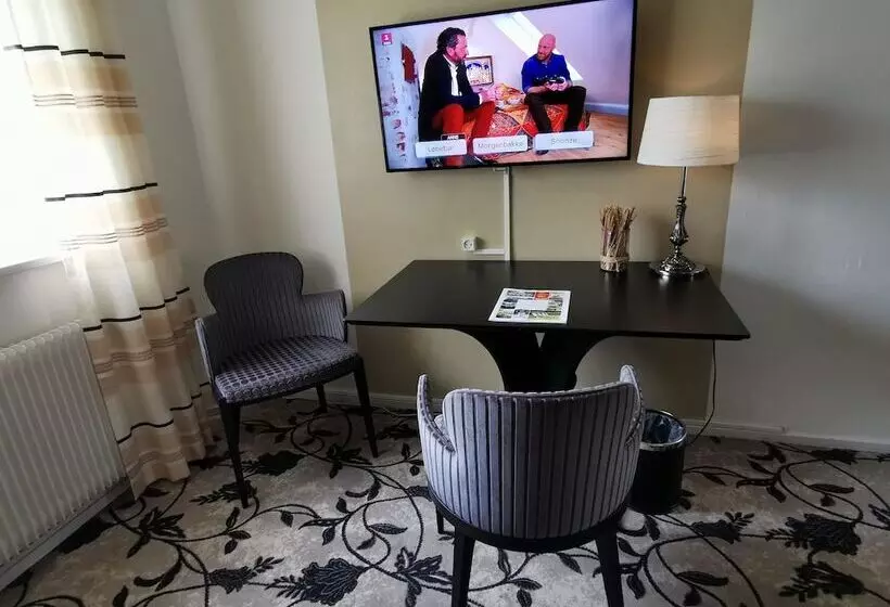 Quarto Estandar, Scheelsminde