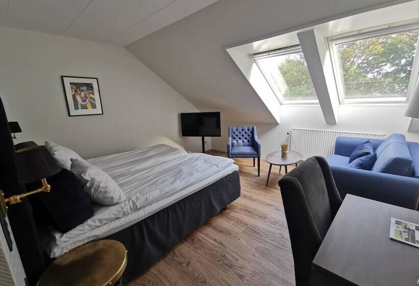 غرفة عائلية, Scheelsminde