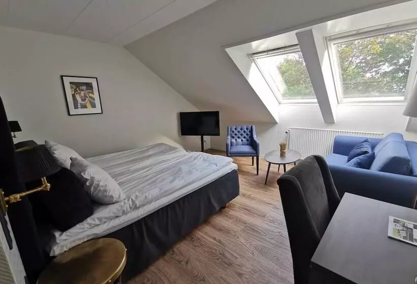 Quarto Familiar, Scheelsminde