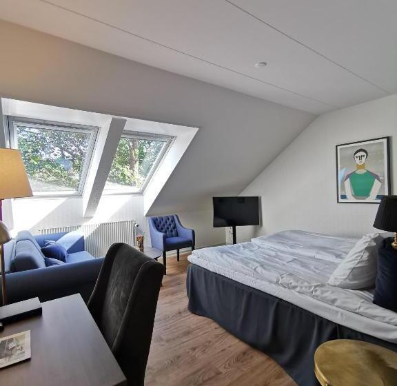 غرفة عائلية, Scheelsminde