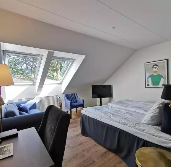 Quarto Familiar, Scheelsminde