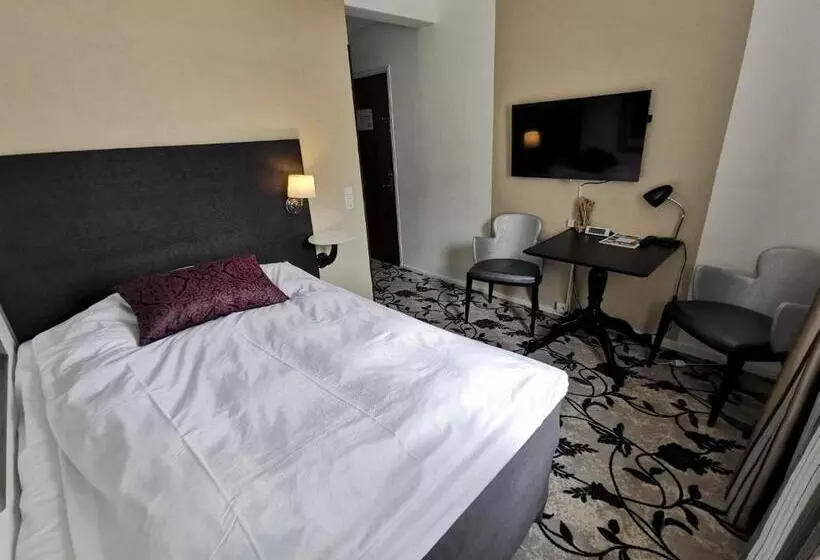 Quarto Basic, Scheelsminde
