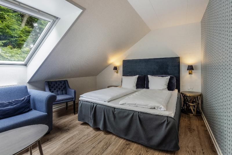 غرفة عائلية, Scheelsminde