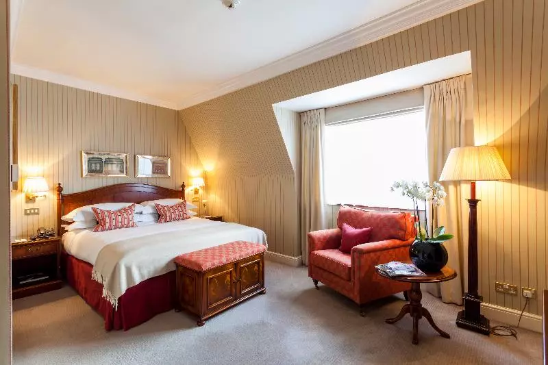 キングサイズベッドのデラックスルーム, The Capital Hotel, Apartments & Townhouse