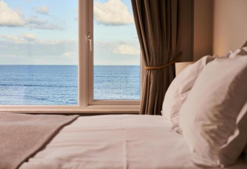 غرفة قياسية مطلّة علي البحر, Pednolva