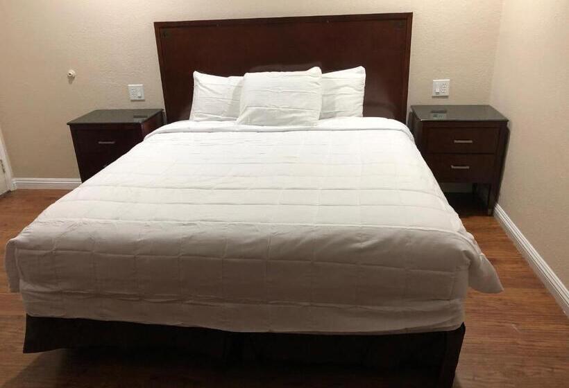 غرفة قياسية سرير كينج, American Inn Ontario