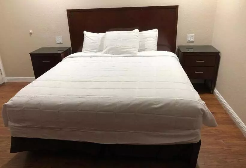 キングサイズベッドのスタンダードルーム, American Inn Ontario