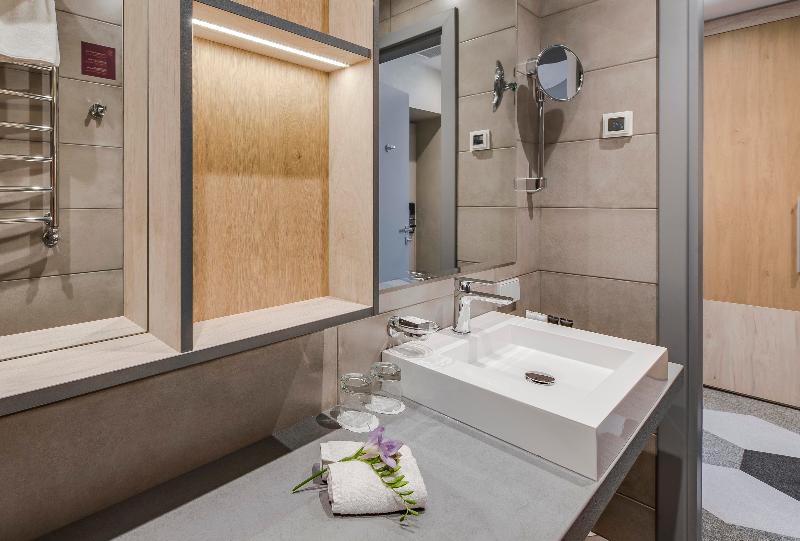 Quarto deluxe, Metropole Hotel By Semarah