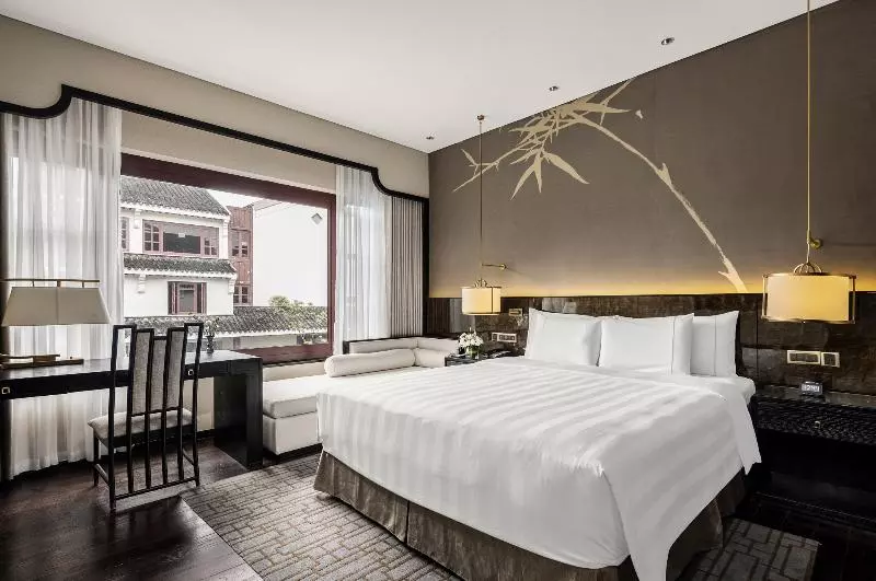キングサイズベッドのデラックスルーム, Pan Pacific Suzhou