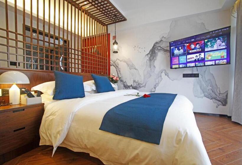 חדר סטנדרט עם מיטת קינג, 張家界武陵源北岸輕奢客棧 森林公園店