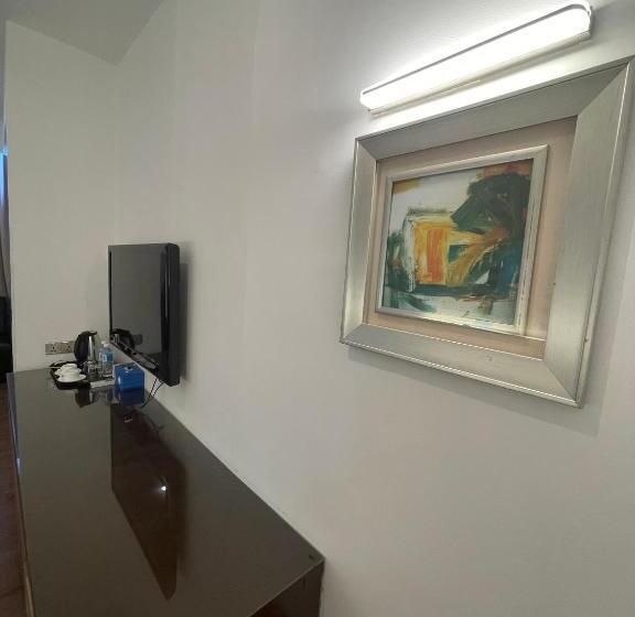 Habitació Triple Deluxe, New World Express Motel