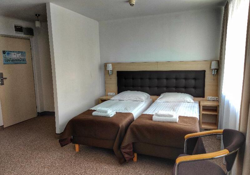 Номер Стандарт, Logos