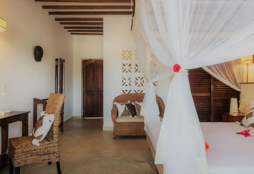 Huoneisto 1 Makuuhuone Puutarhanäkymä, Zanzibar Magic Boutique