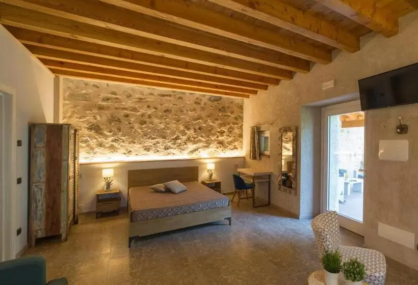 庭の見えるスタンダードトリプルルーム, Agriturismo Casarai