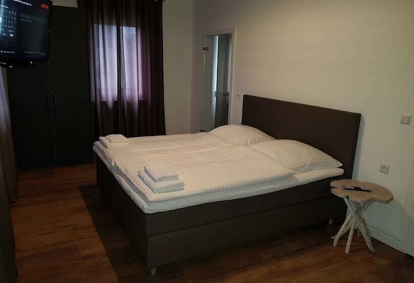 Quarto Triplo Comfort, Krone Ug