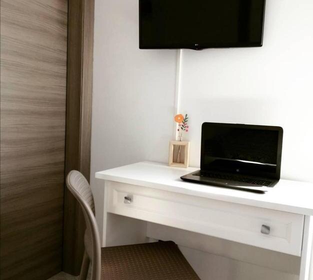 标准三人间, Il Magnolia