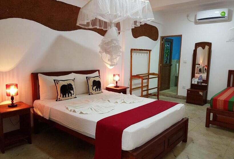 اتاق استاندارد سه تخته با چشم‌انداز باغ, The Nature Park Villa