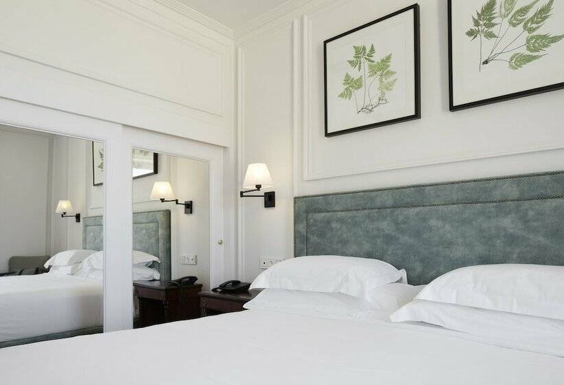 חדר בסיסי, De Londres Y De Inglaterra