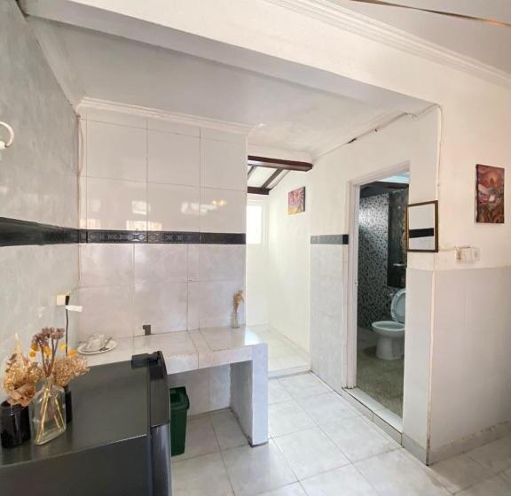 Habitació Deluxe, Kris Kos