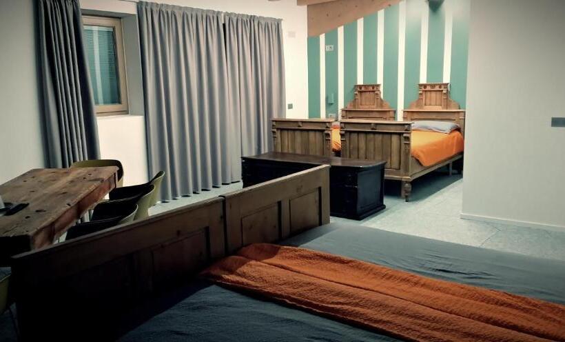 غرفة ديلوكس رباعية, Nonsolomele