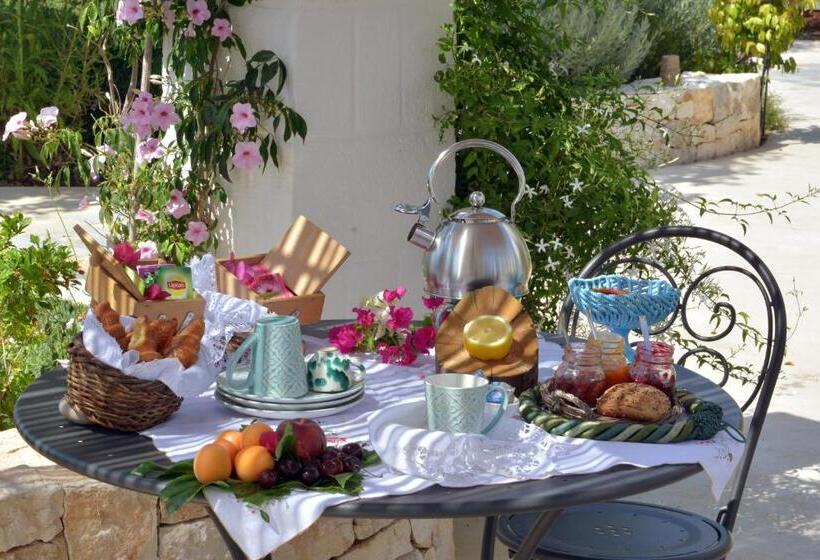 סוויטה נוף לגינה, Echi Di Puglia