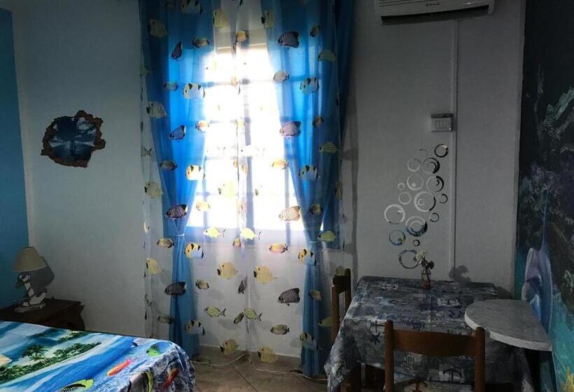 חדר סטנדרט לשלושה עם נוף לגינה, Acquamarina B&b