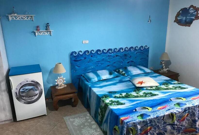 חדר סטנדרט לשלושה עם נוף לגינה, Acquamarina B&b