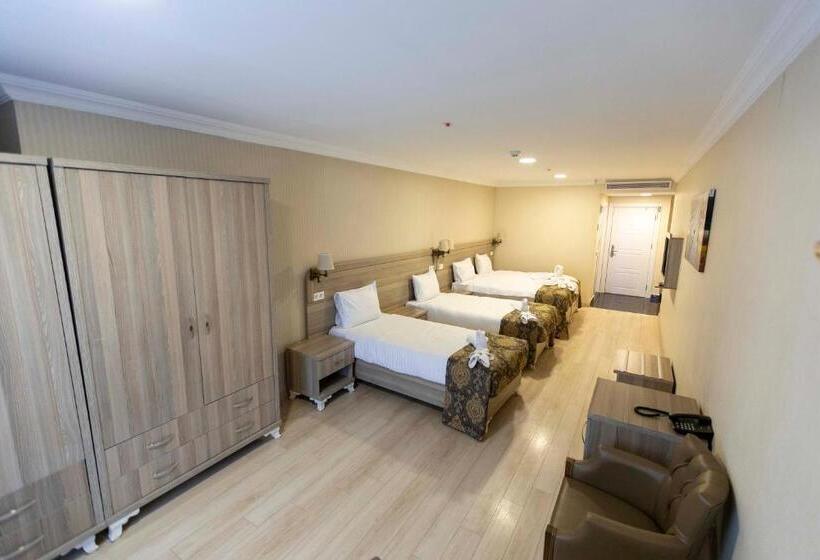 Quarto Quádruplo Estandar, World Point Hotel Besyol