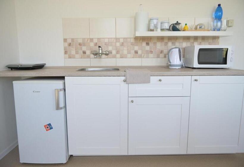 סוויטה משפחתית, Penzion švýcarský Dům