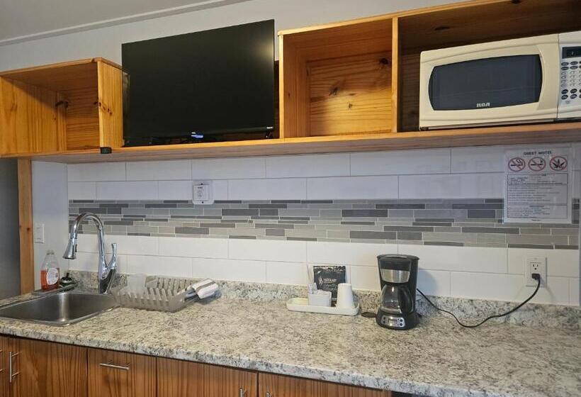 غرفة ديلوكس, Quest Motel