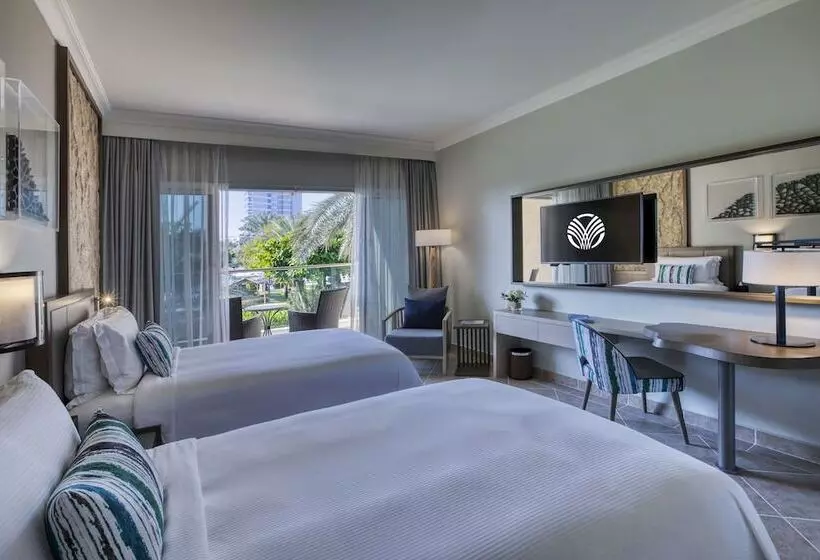 اتاق استاندارد با بالکن و چشم‌انداز باغ, Fujairah Rotana Resort & Spa   Al Aqah Beach