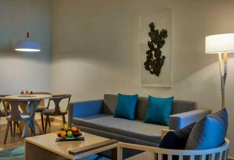 اتاق استاندارد با چشم‌انداز باغ, Fujairah Rotana Resort & Spa   Al Aqah Beach