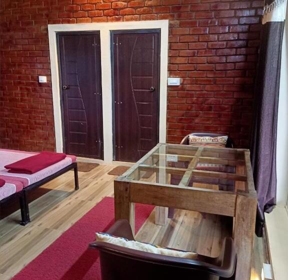 Quarto Quadruple Standart com Varanda, Riverstone Riverfront Stay