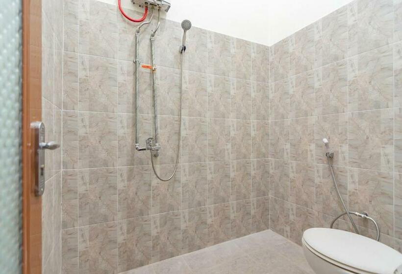 스탠다드 룸, The Lima Guest House Syariah Mitra Reddoorz