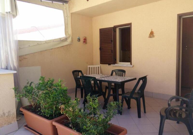 غرفة قياسية ثلاثية, Locanda Scirocco