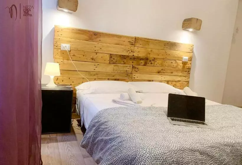 Economy Triple Room, Nizza Creative
