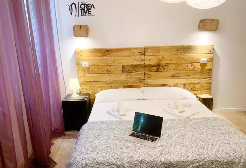 Economy Triple Room, Nizza Creative
