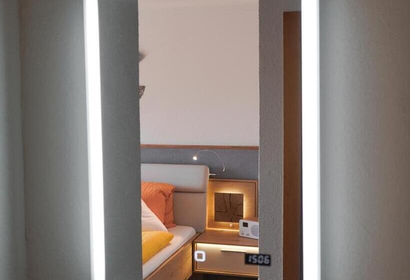 חדר דלוקס, Alpina