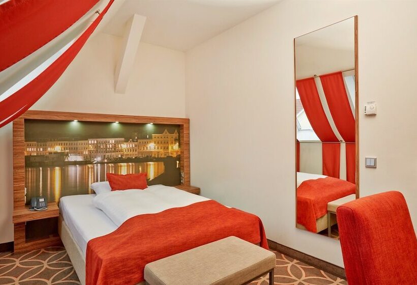 Номер Deluxe, H+ Hotel Lübeck