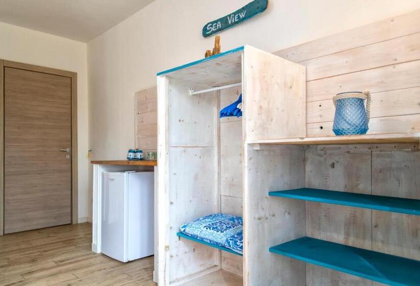 غرفة سوبيريور ثلاثية مطلّة علي البحر, Dery Alghero Holiday Rooms