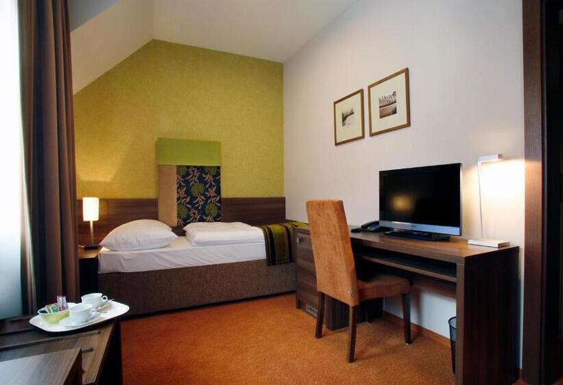 Номер Economy, Belassi