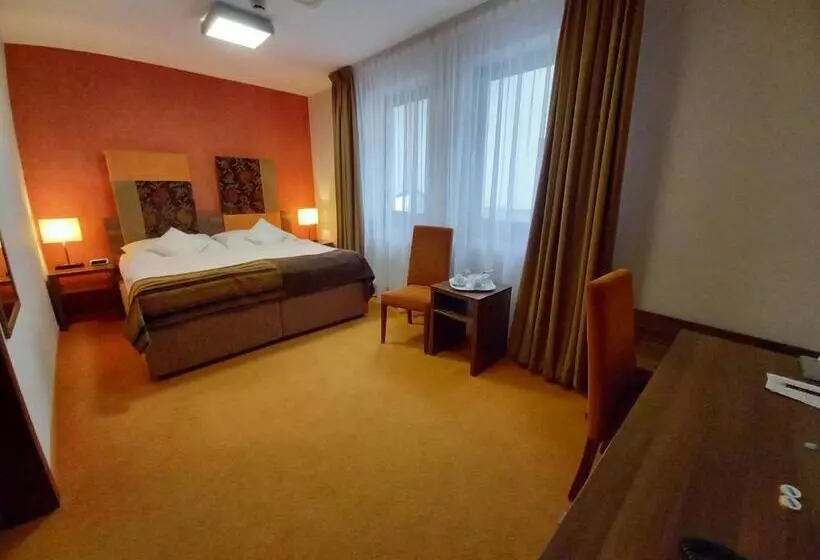 Standard-huone, Belassi