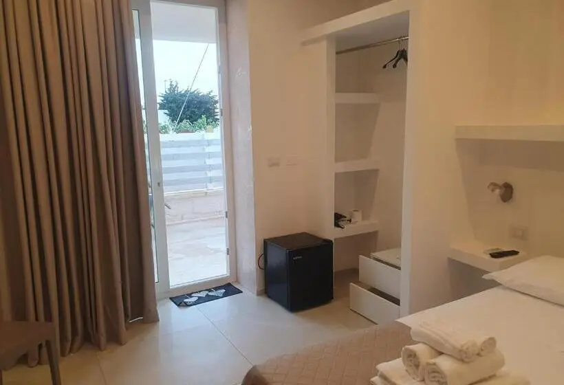اتاق استاندارد سه تخته با چشم‌انداز باغ, Sea Beach Home