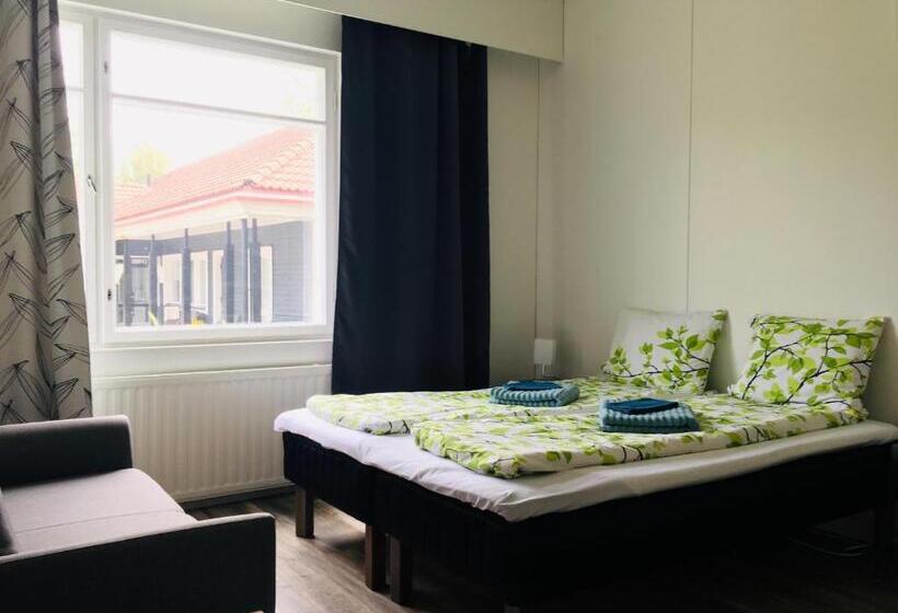 חדר סטנדרטי לארבעה עם חדר אמבטיה משותף, Villa Saimaan Sydän