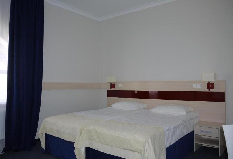 اتاق استاندارد, Optima Pochayiv