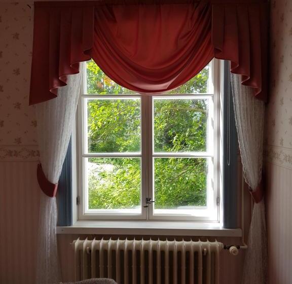 غرفة قياسية, Taulun Kartano