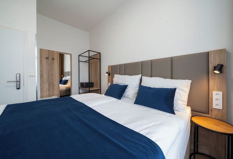 Quarto Estandar, Leon